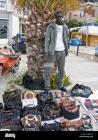 Прикрепленное изображение: african-selling-fake-luxury-handbags-nafplion-argolis-province-peloponnese-B085HK.jpg
